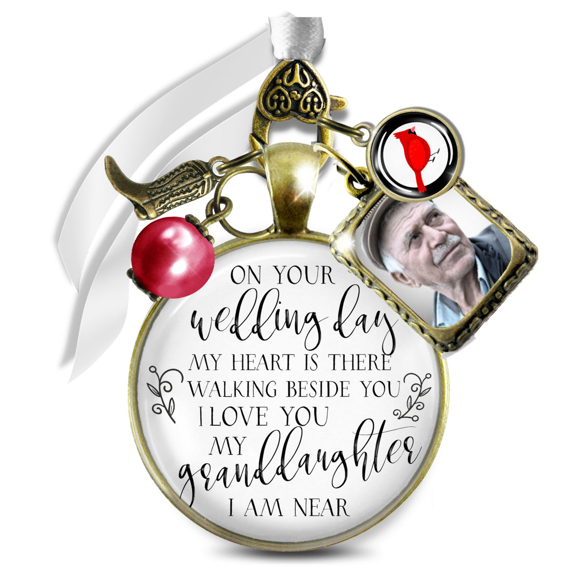 Handcrafted bronze wedding bouquet memorial charm for a granddaughter featuring a custom grandfather photo frame, red cardinal accent, angel wing, pearl bead, and scripted quote: "On your wedding day my heart is there, walking beside you I love you my granddaughter I am near."