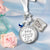 Gutsy Goodness silver bridal bouquet photo charm with heaven quote pendant, blue bead, and personalized picture frame beside pink roses